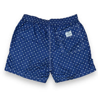 White dots on solid navy blue swimsuit