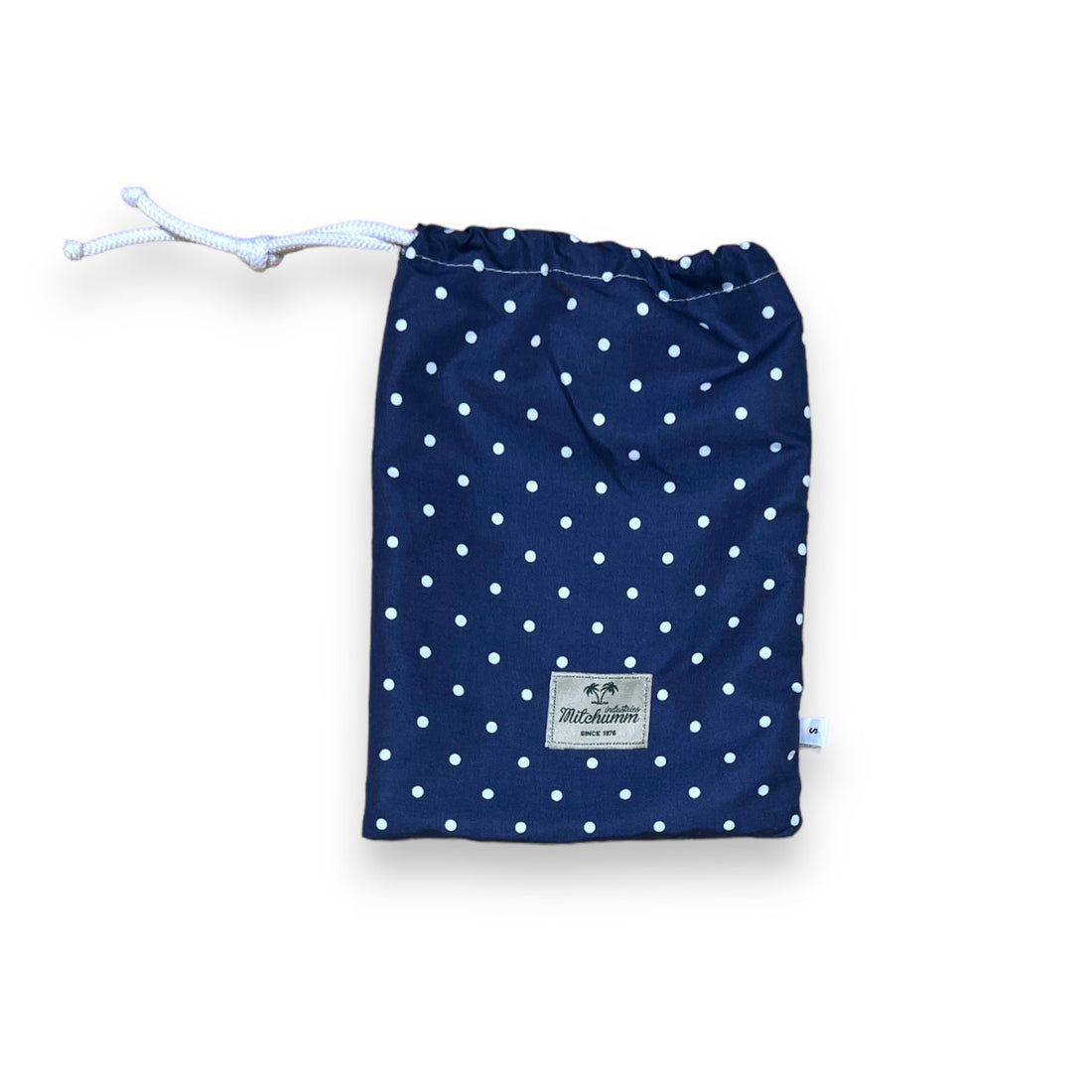 White dots on solid navy blue swimsuit
