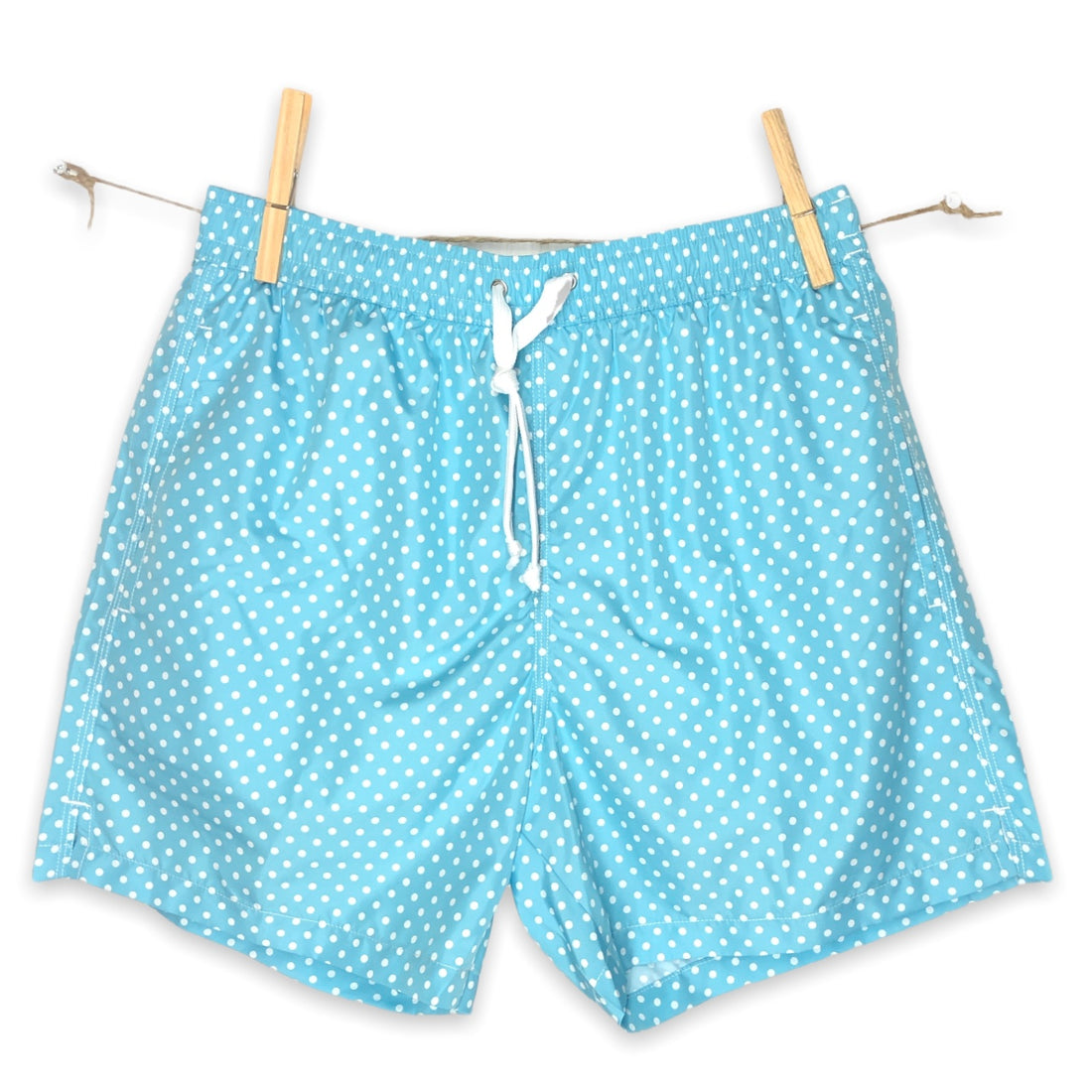 White dots on solid cyan swimsuit
